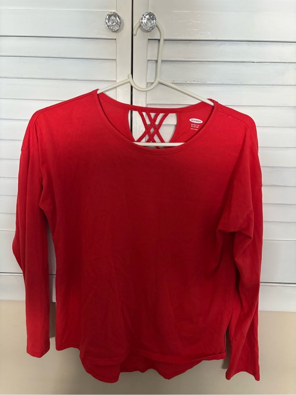Youth girl Old Navy 14/16 long sleeve top with criss cross back
